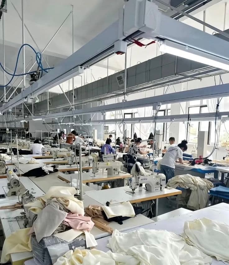 Facility photos — machines, team, stock, packing 2